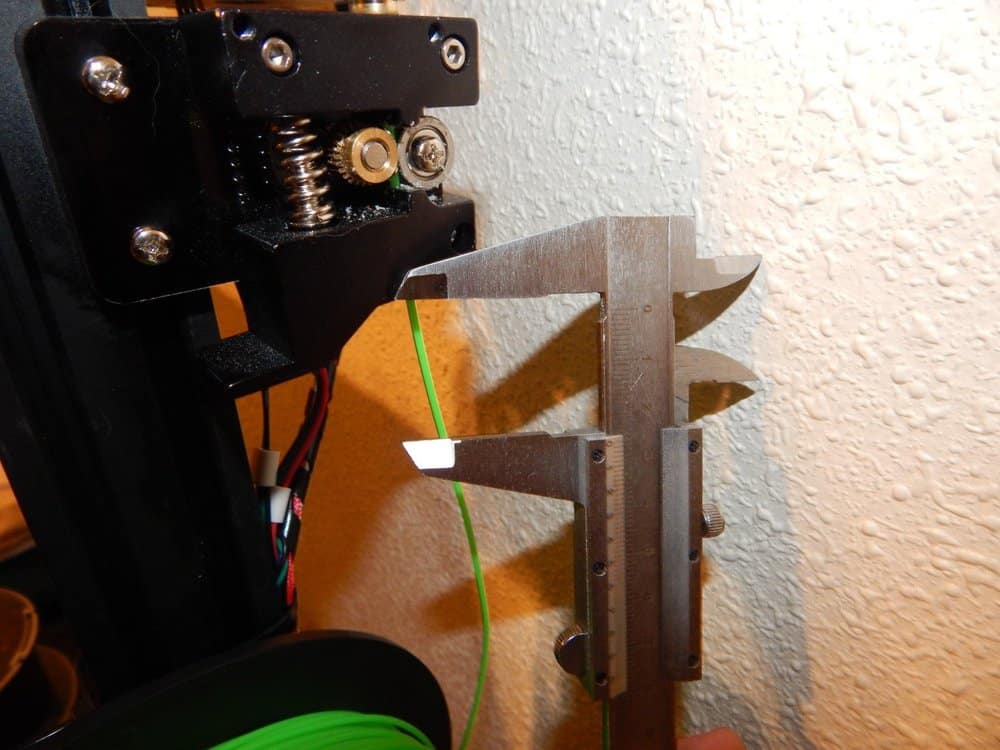 Make a mark on your filament and begin extruding